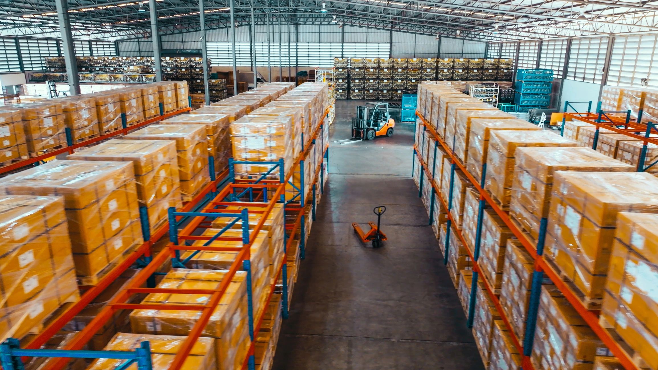 Warehouse shelving with packaged goods for logistics operations
